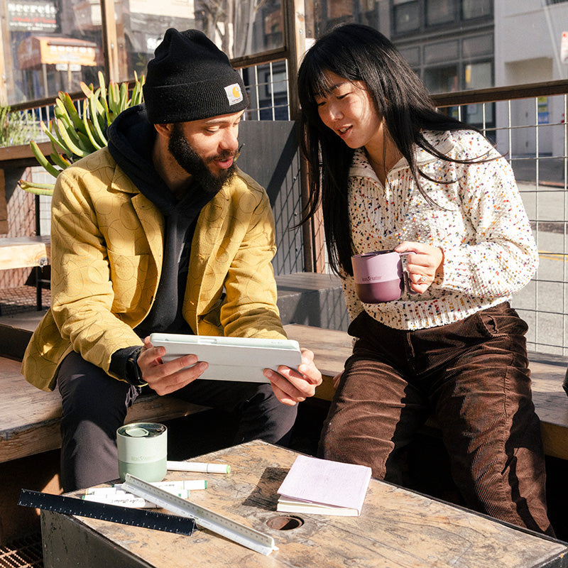 12oz-rise-mug-j8 12oz_rise_coffee_mug_dusty_orchid_couple_city_patio_square.jpg