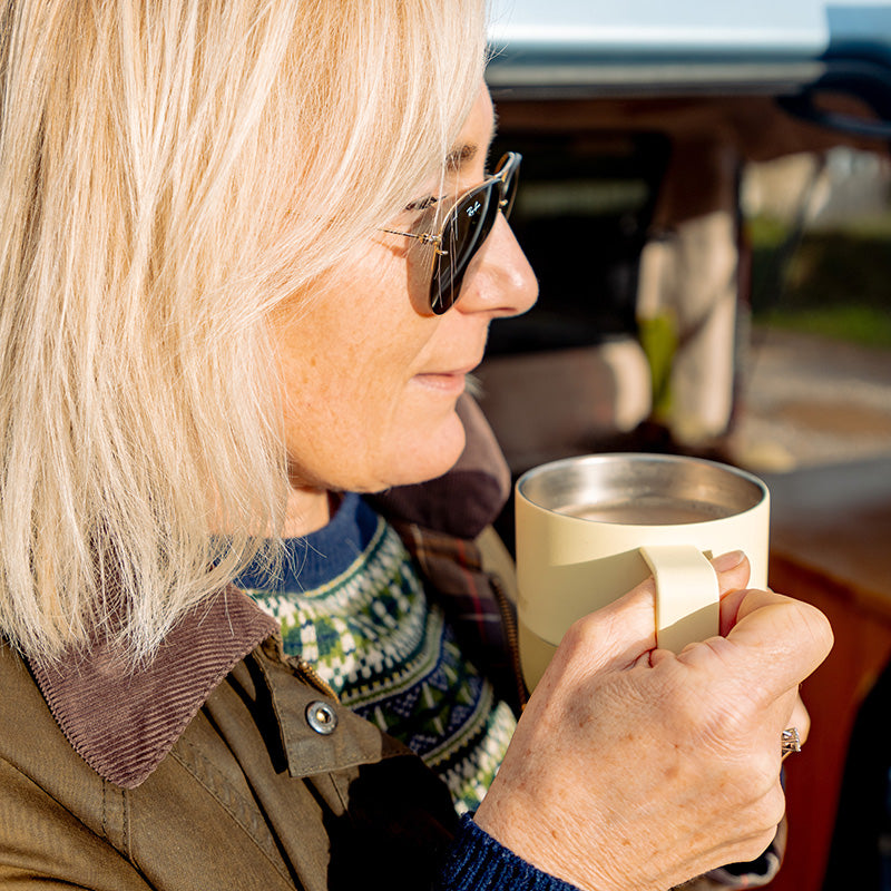 12oz-rise-mug-j8 12oz_rise_coffee_mug_wax_yellow_woman_drink_closeup_square.jpg