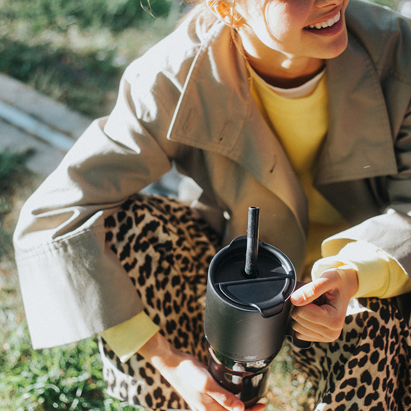 26oz-rise-tumbler-with-straw-lid-c2 26oz_rise_tumbler_black_woman_topview_square.jpg