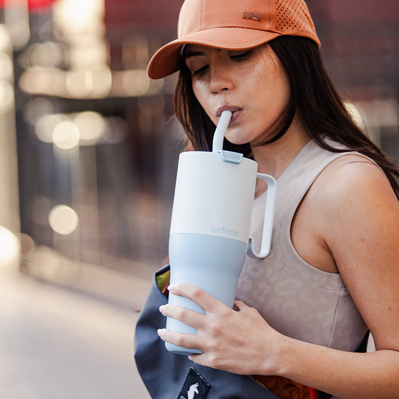 36oz-rise-tumbler-with-straw-lid-f5 36oz_rise_tumbler_straw_girl_sip_square.jpg