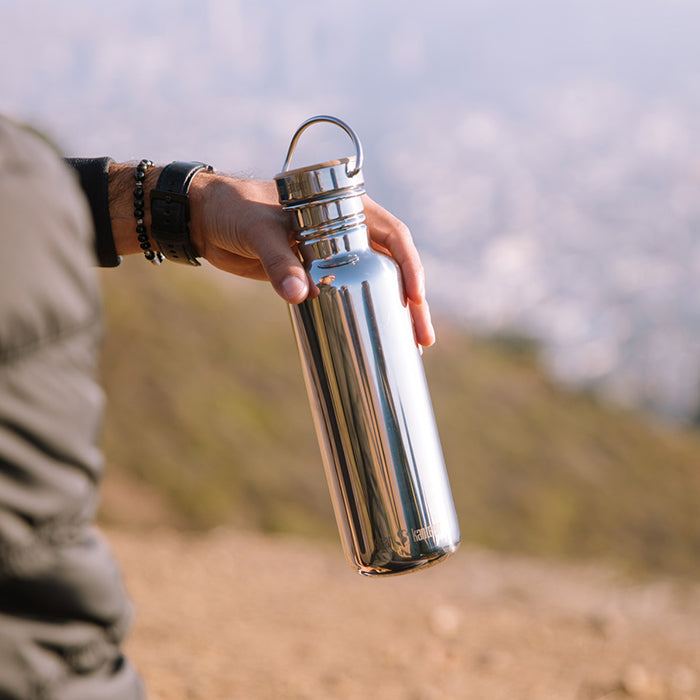 27oz-reflect-with-bamboo-cap-l8 K27SSLRF-MS-BAMBOO_reflect_bottle_hand_lifestyle.jpg