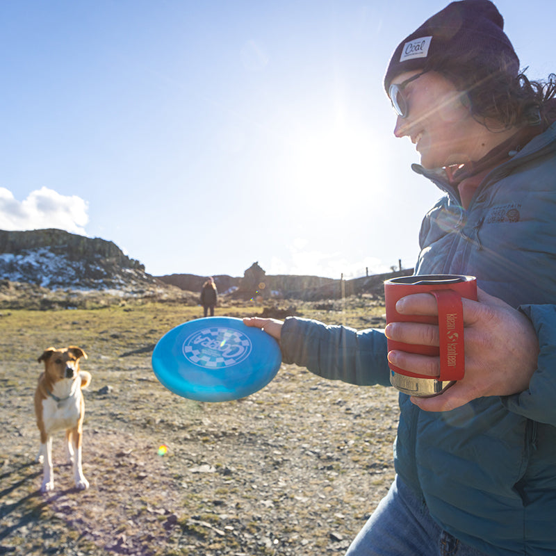 12oz-camp-mug-n1 insulated_camp_mug_12oz_woman_dog_frisbee_square.jpg